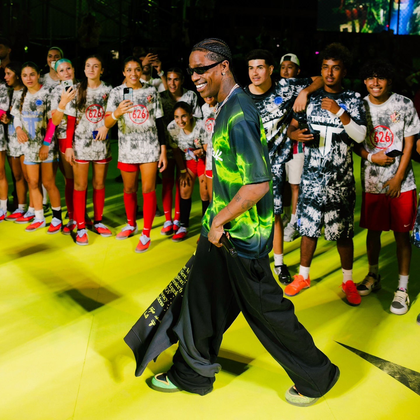 Travis Scott wearing the Cactus Plant Flea Market x Nike Swamp Sponge Dunk at Toma El Juego Los Angeles