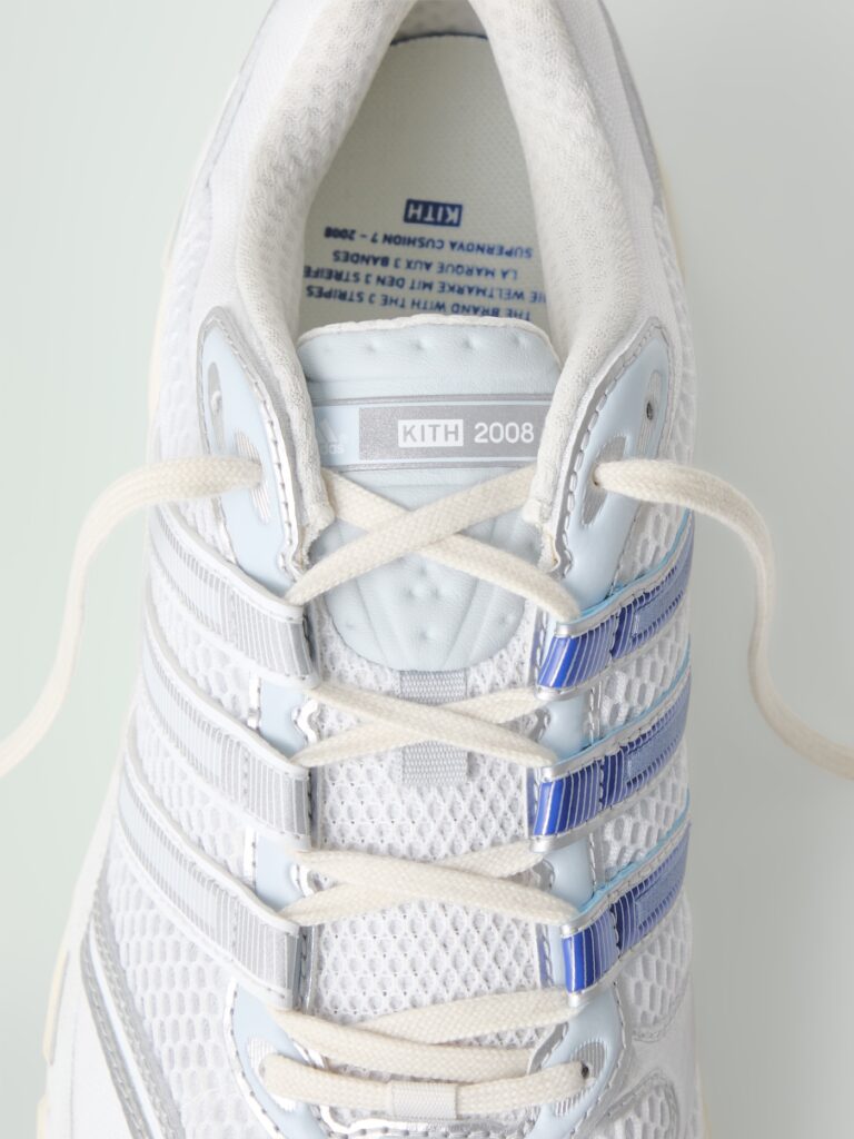 Kith x adidas Supernova Cushion 7
Color: White/Royal/Silver
Style Code: JQ9296