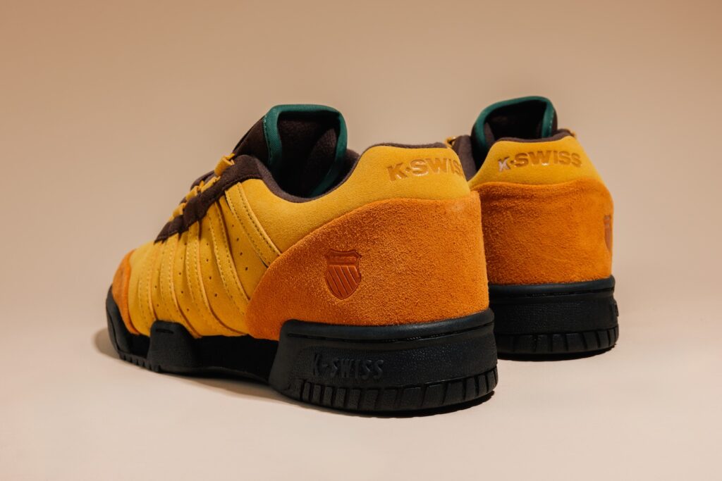 Anwar Carrots x K-Swiss KSRC GSTADD
Color: Nugget Gold/Pumpkin Spice/Black
Style Code: 74610-230-M