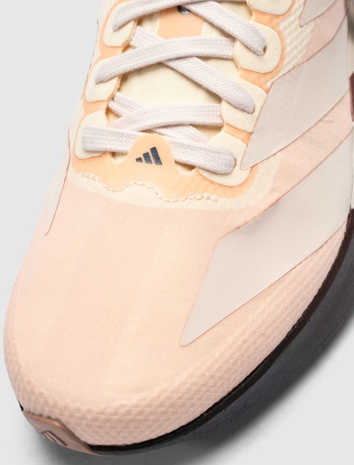 The Whitaker Group x adidas Adizero Evo SL 404 Peachtree
