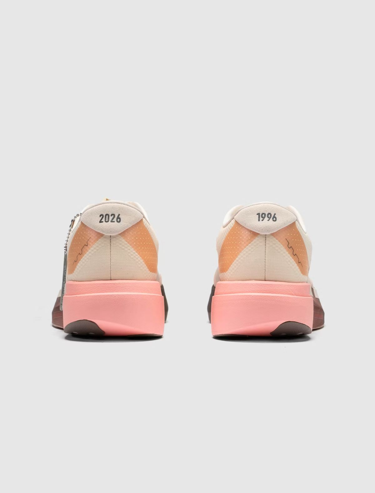 The Whitaker Group x adidas Adizero Evo SL 404 Peachtree
