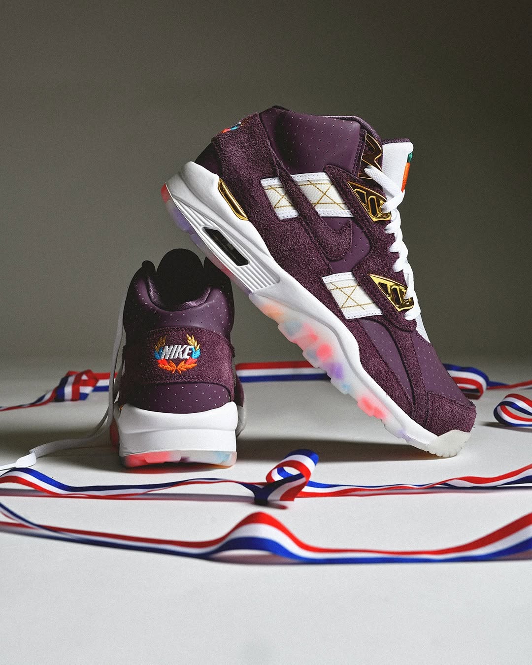 Nike Air Trainer SC Atlanta Olympics pair in purple white and metallic gold