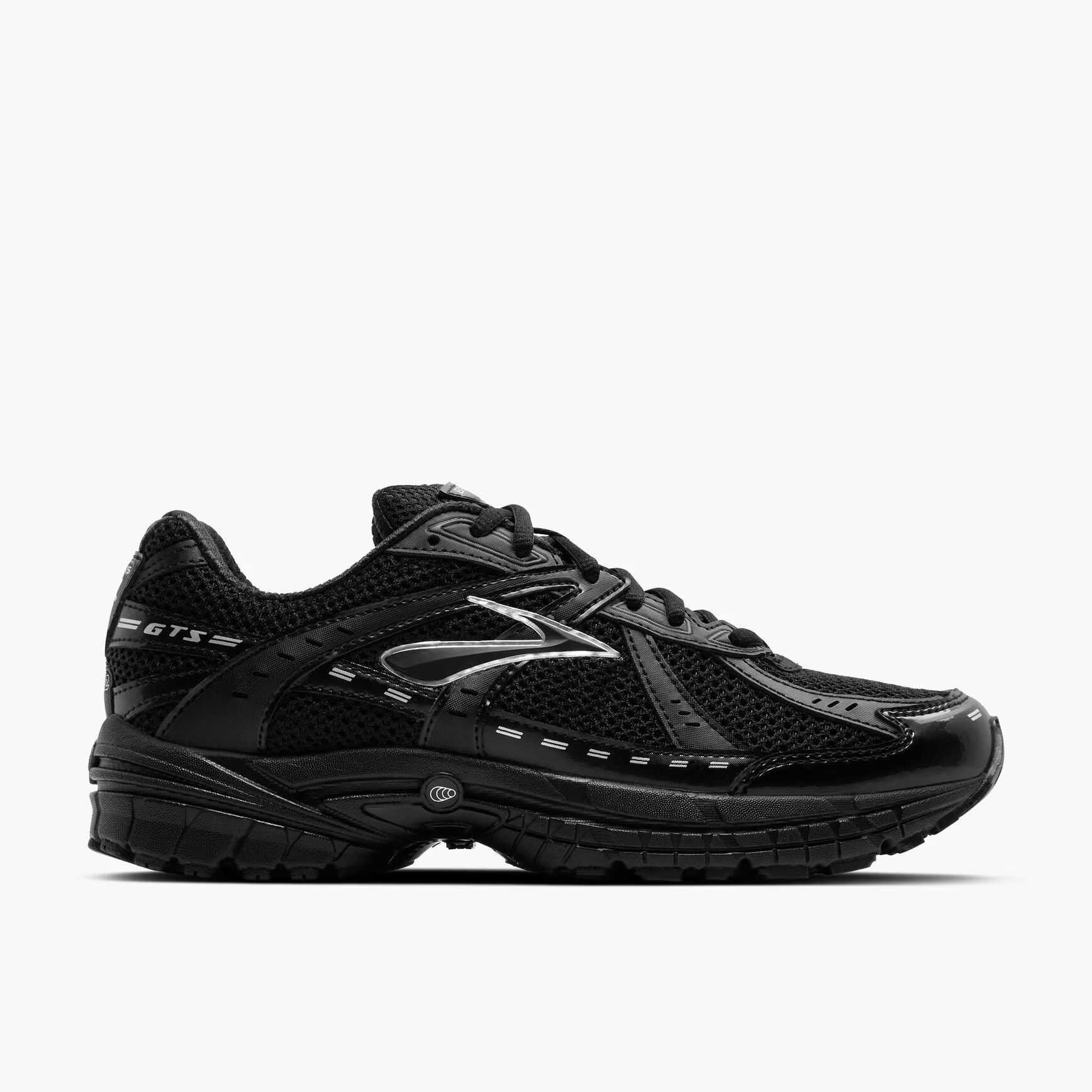 Brooks Adrenaline GTS 10 in Black, Ebony, and Silver featuring a retro running design with layered mesh and synthetic overlays.