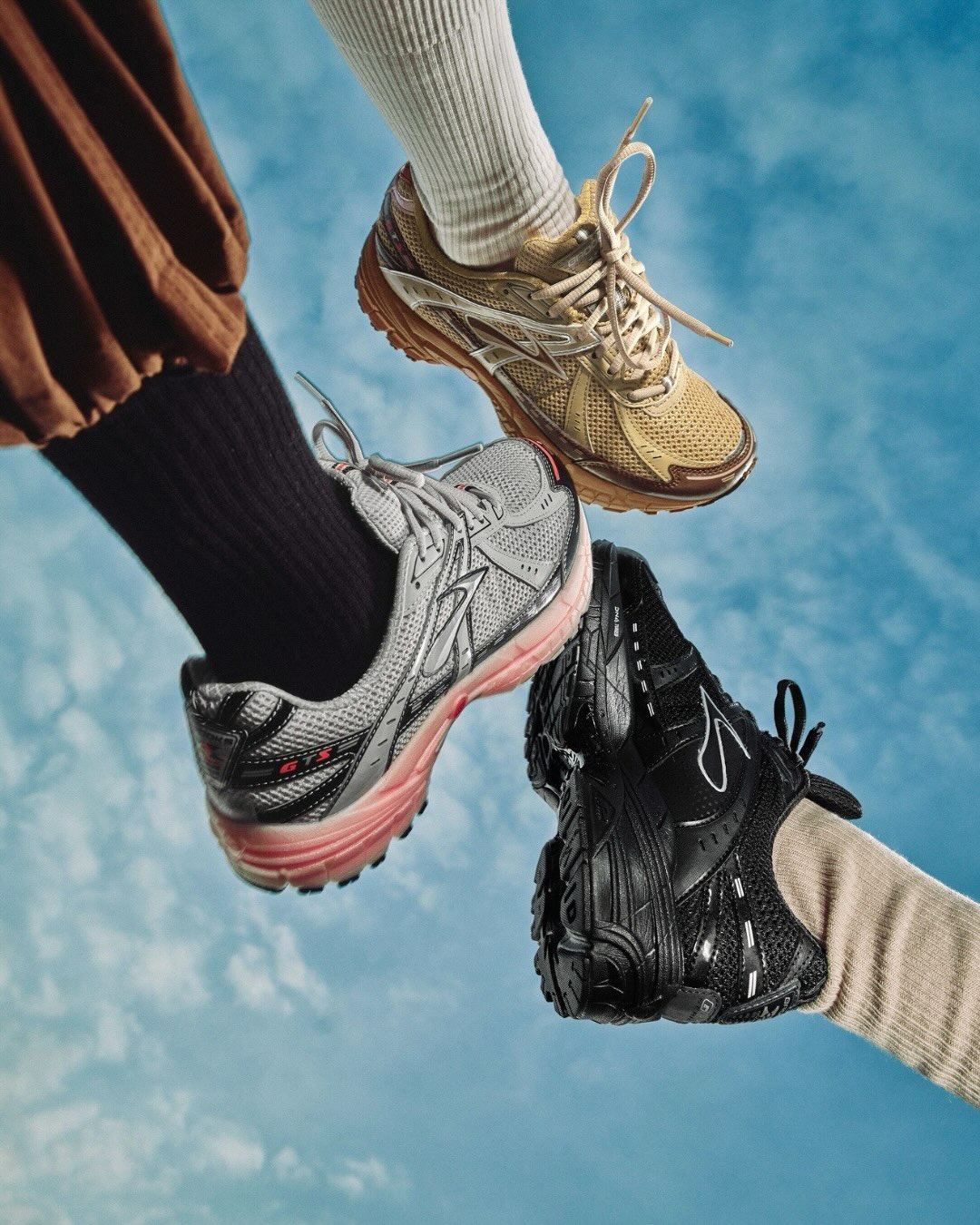 Brooks Adrenaline GTS 10 lifestyle sneakers in Black/Ebony/Silver, Quiet Grey/Black/Coral Rose, and Wood Thrush/Cub/Soybean colorways.